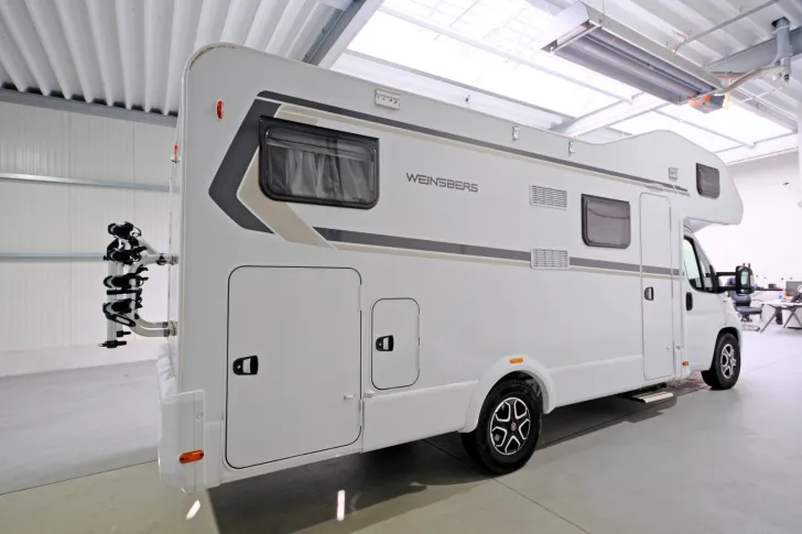 Fahrzeugbild Weinsberg CaraHome 700 DG/1.Hand/Festbett/Garage/Klima #2