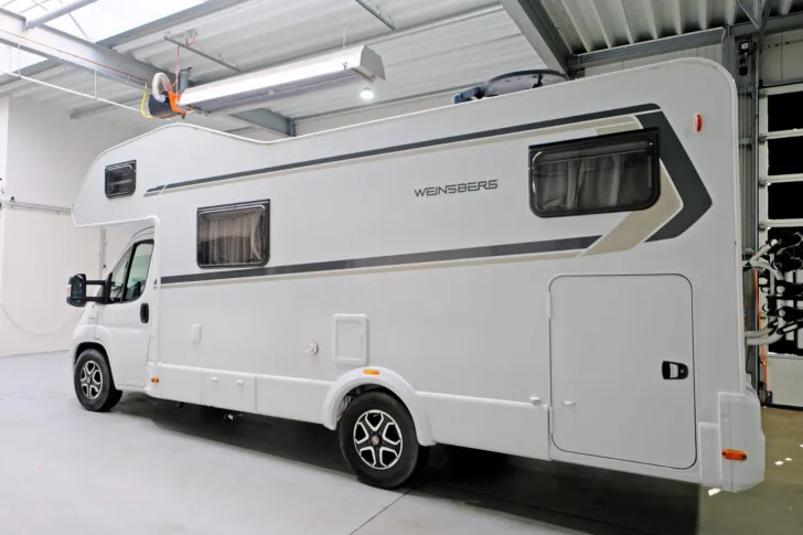 Fahrzeugbild Weinsberg CaraHome 700 DG/1.Hand/Festbett/Garage/Klima #3