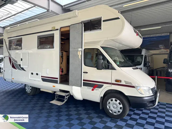 Fahrzeugbild Carthago Mondial 45 R Alkoven Rundsitzgruppe #1