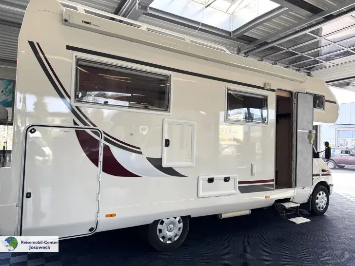 Fahrzeugbild Carthago Mondial 45 R Alkoven Rundsitzgruppe #2