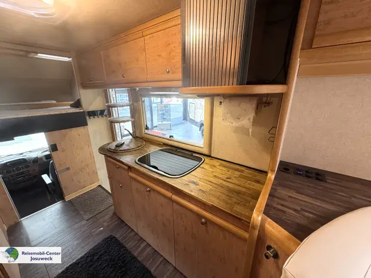 Fahrzeugbild Carthago Mondial 45 R Alkoven Rundsitzgruppe #11