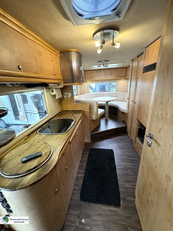 Fahrzeugbild Carthago Mondial 45 R Alkoven Rundsitzgruppe #12