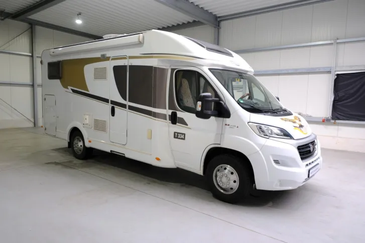 Fahrzeugbild Carado T 334/Festbett/Hubbett/Garage/Tempomat #2