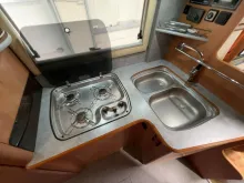 Fahrzeugbild Carthago Opus/Festbett+Hubbett/Garage/Klima/Solar/Markise #13